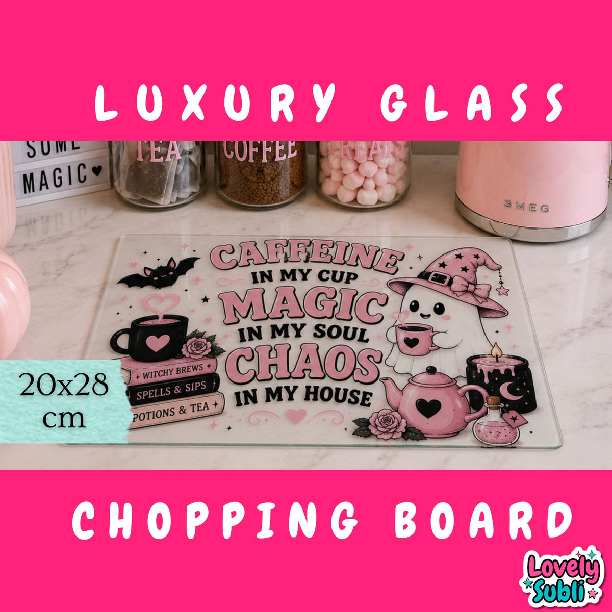 A pink and black Halloween-themed glass cutting board displayed on a white marble countertop with kitchen items in the background. The board features a cartoon ghost in a witch hat, a teapot, a mug, and the text 'CAFFEINE IN MY CUP MAGIC IN MY SOUL CHAOS IN MY HOUSE'.