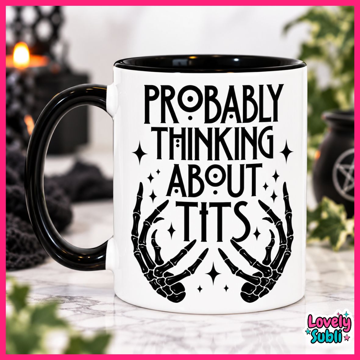 A white ceramic mug with a black handle and black interior, printed with the phrase 'PROBABLY THINKING ABOUT TITS' in black lettering above skeletal hands and sparkles. The mug is photographed on a marble-like surface with a blurred Halloween-themed background.