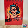 A spiral-bound notebook with a red cover featuring a retro pop-art illustration of a woman with blue hair, sunglasses, and a red bow, with the word 'RESPECTFULLY' printed in bold black letters. The notebook is standing on a light wooden surface against a neutral background.